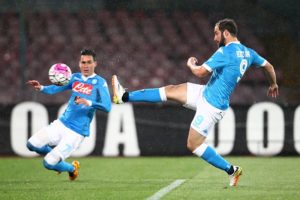 Napoli's Argentinian-French forward Gonzalo Higuain (R) kicks to score near his teammate Napoli's Spanish forward Jose Maria Callejon during the Italian Serie A football match between SSC Napoli and Atalanta BC at San Paolo Stadium in Naples on May 2, 2016. / AFP / CARLO HERMANN        (Photo credit should read CARLO HERMANN/AFP/Getty Images)